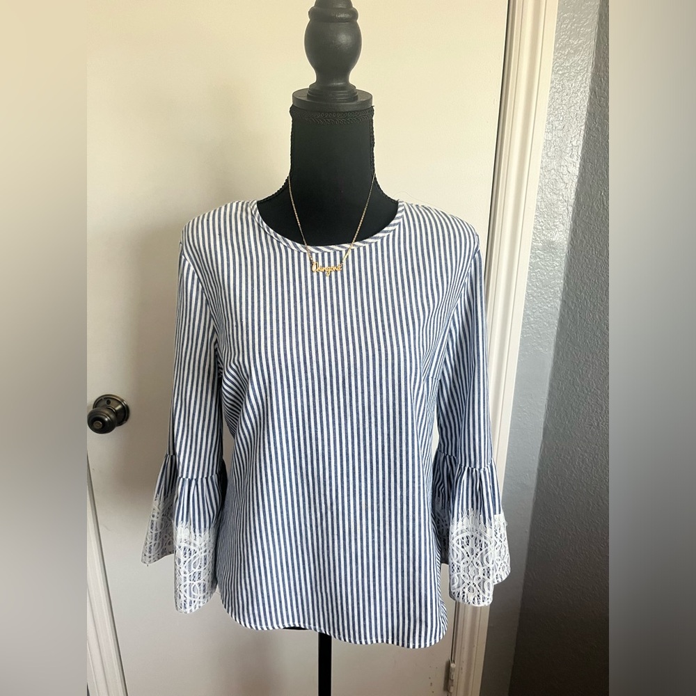 Striped navy and white long sleeve shirt, perfect for fall.